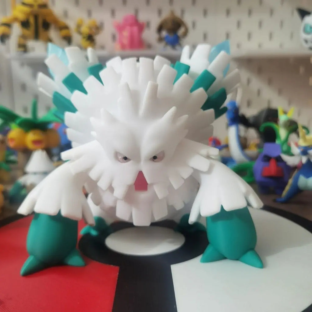 Figurines Pokémon de Blizzi, Blizzaroi et sa forme Méga-Blizzaroi.
