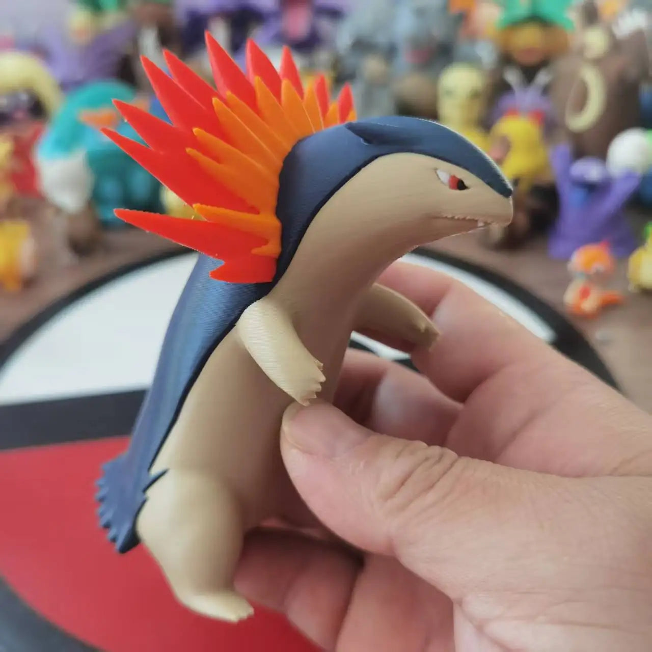 Figurines Pokémon du starter Feu de Johto : Héricendre, Feurisson et Typhlosion.