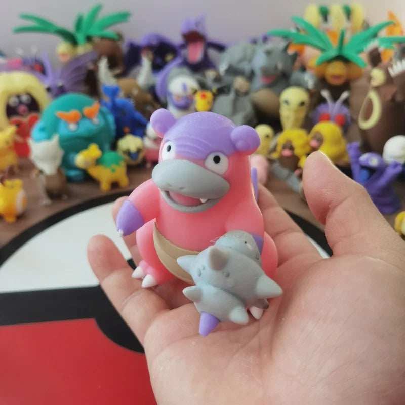 Ensemble de figurines Pokémon de la famille Ramoloss, Flagadoss et Roigada (versions classiques et de Galar).