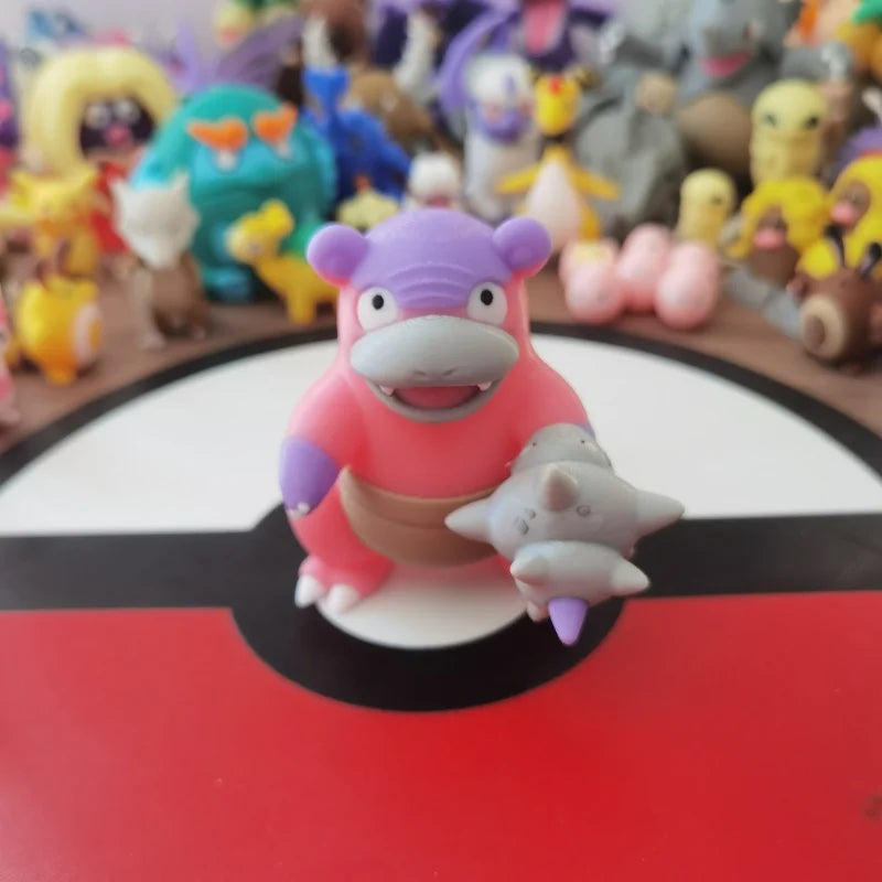 Ensemble de figurines Pokémon de la famille Ramoloss, Flagadoss et Roigada (versions classiques et de Galar).