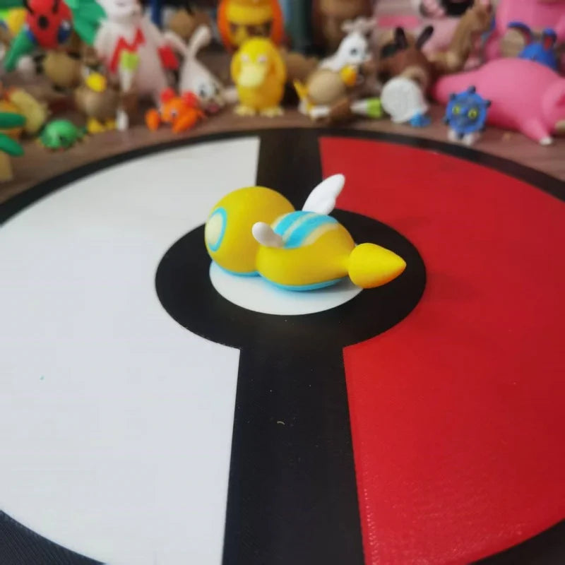 Figurines Pokémon de la ligne évolutive d'Insolourdo et sa forme évoluée Deuxdouspikes.