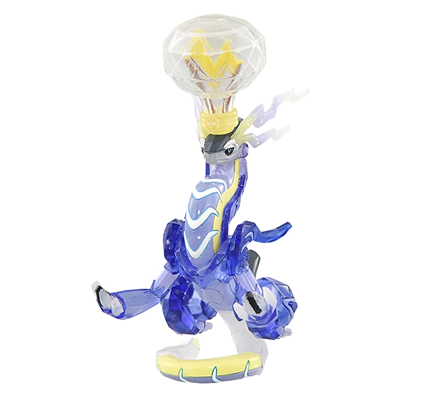 Sélection de figurines Pokémon variées incluant des Pokémon emblématiques, des formes de Teracristal et des dresseurs.