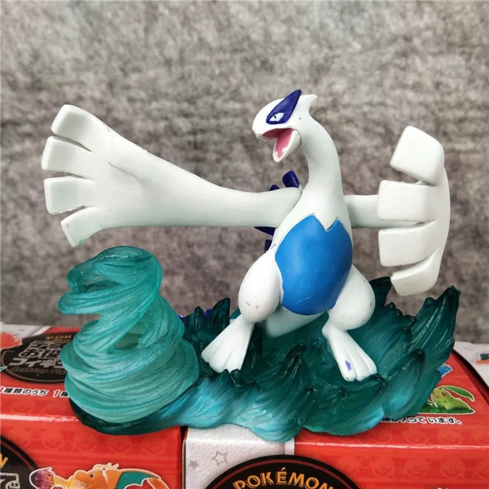 Ensemble de figurines Pokémon incluant des formes Teracristal translucides et des lignes évolutives