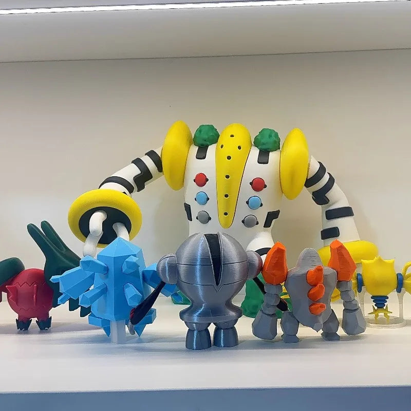 Ensemble de figurines représentant le titan Regigigas entouré des autres Golems légendaires à l'échelle 1/20.