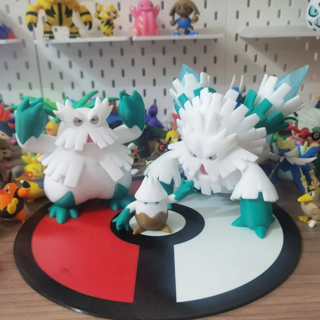 Figurines Pokémon de Blizzi, Blizzaroi et sa forme Méga-Blizzaroi.