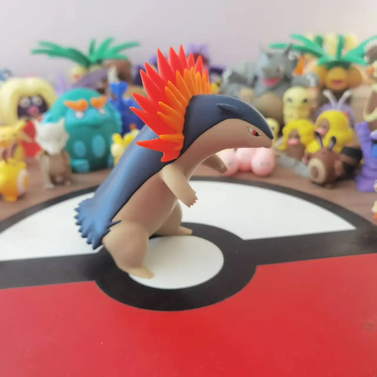 Figurines Pokémon du starter Feu de Johto : Héricendre, Feurisson et Typhlosion.