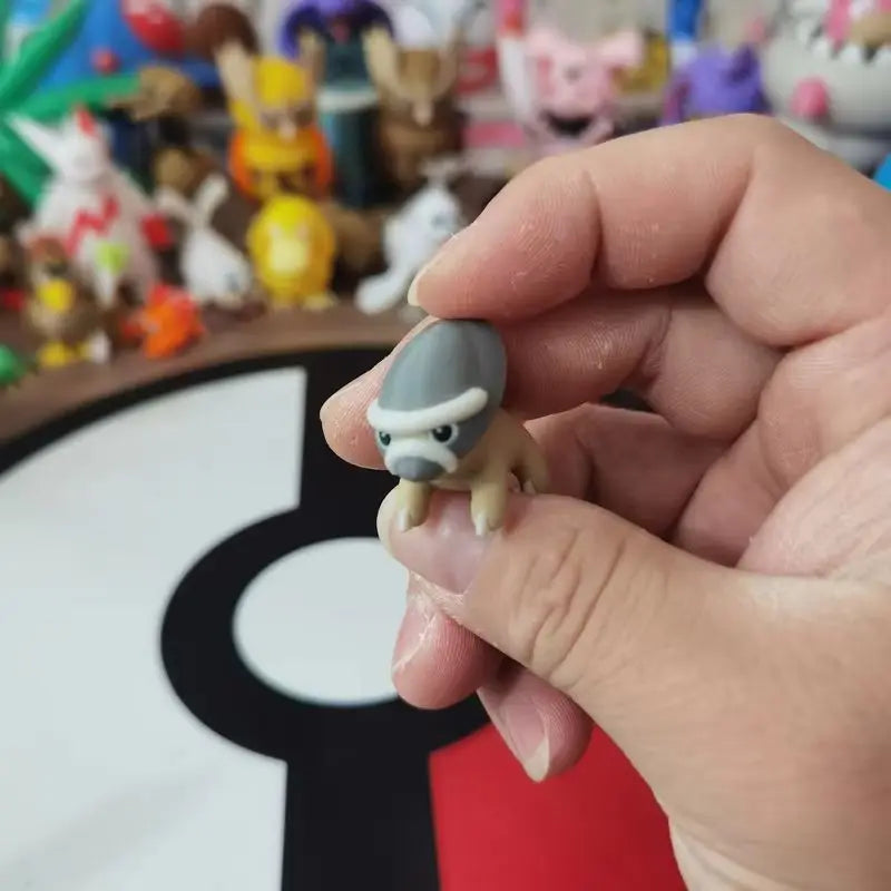 Figurines Pokémon fossiles de Dinoclier et son évolution Bastiodon.