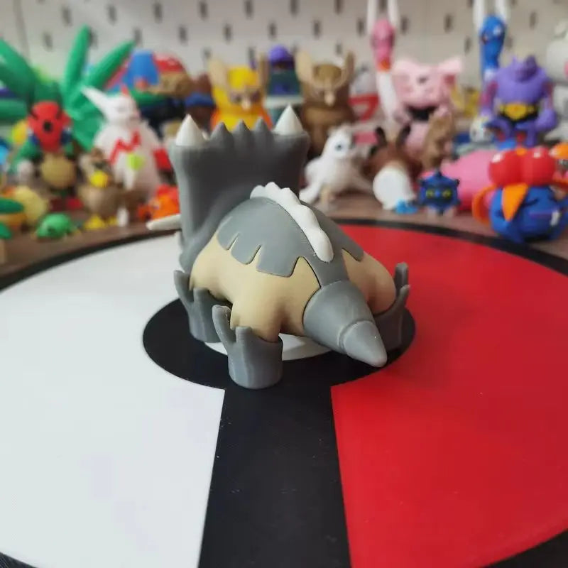 Figurines Pokémon fossiles de Dinoclier et son évolution Bastiodon.