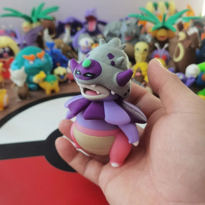 Ensemble de figurines Pokémon de la famille Ramoloss, Flagadoss et Roigada (versions classiques et de Galar).