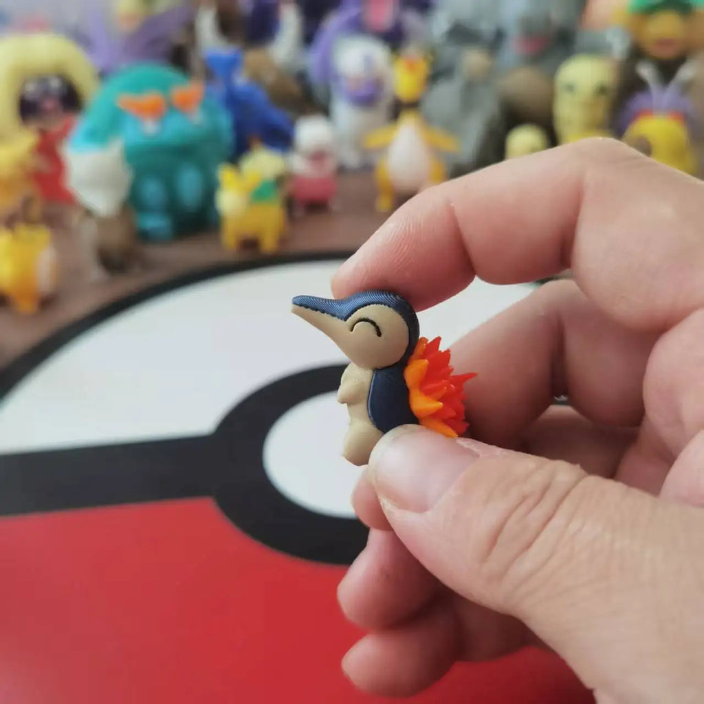 Figurines Pokémon du starter Feu de Johto : Héricendre, Feurisson et Typhlosion.