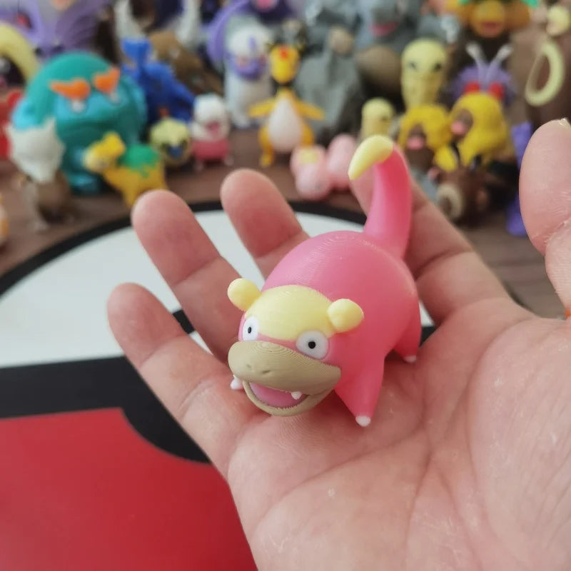 Ensemble de figurines Pokémon de la famille Ramoloss, Flagadoss et Roigada (versions classiques et de Galar).