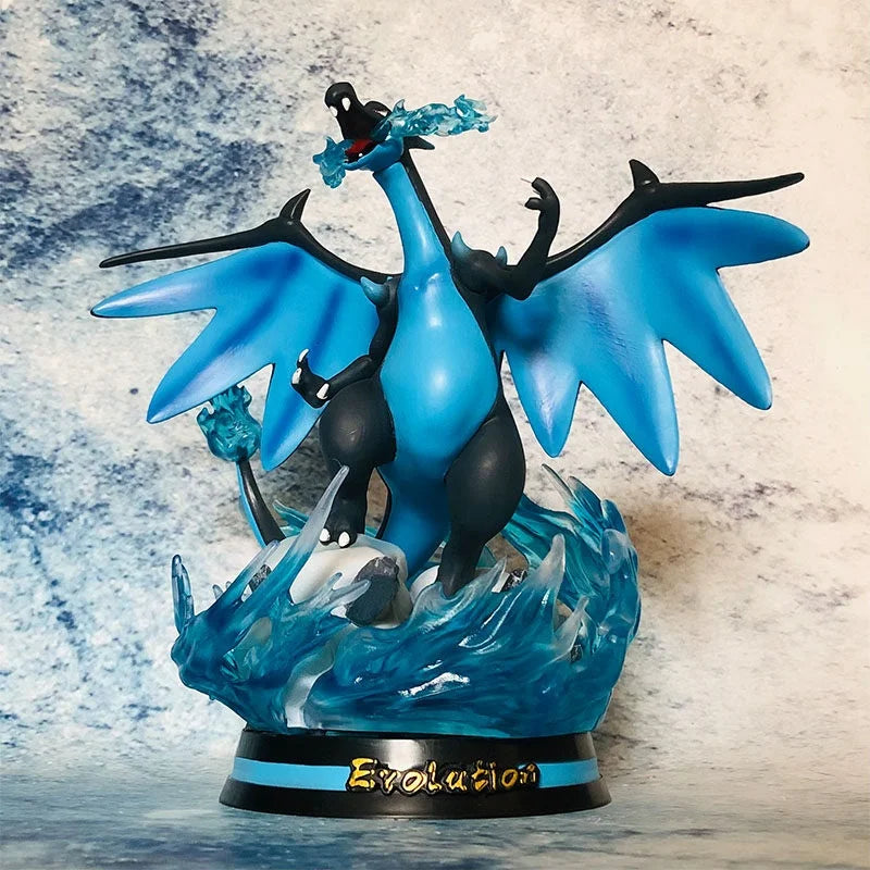 Statues de collection premium représentant divers Pokémon emblématiques accompagnés de socles et d'effets d'attaque spectaculaires.