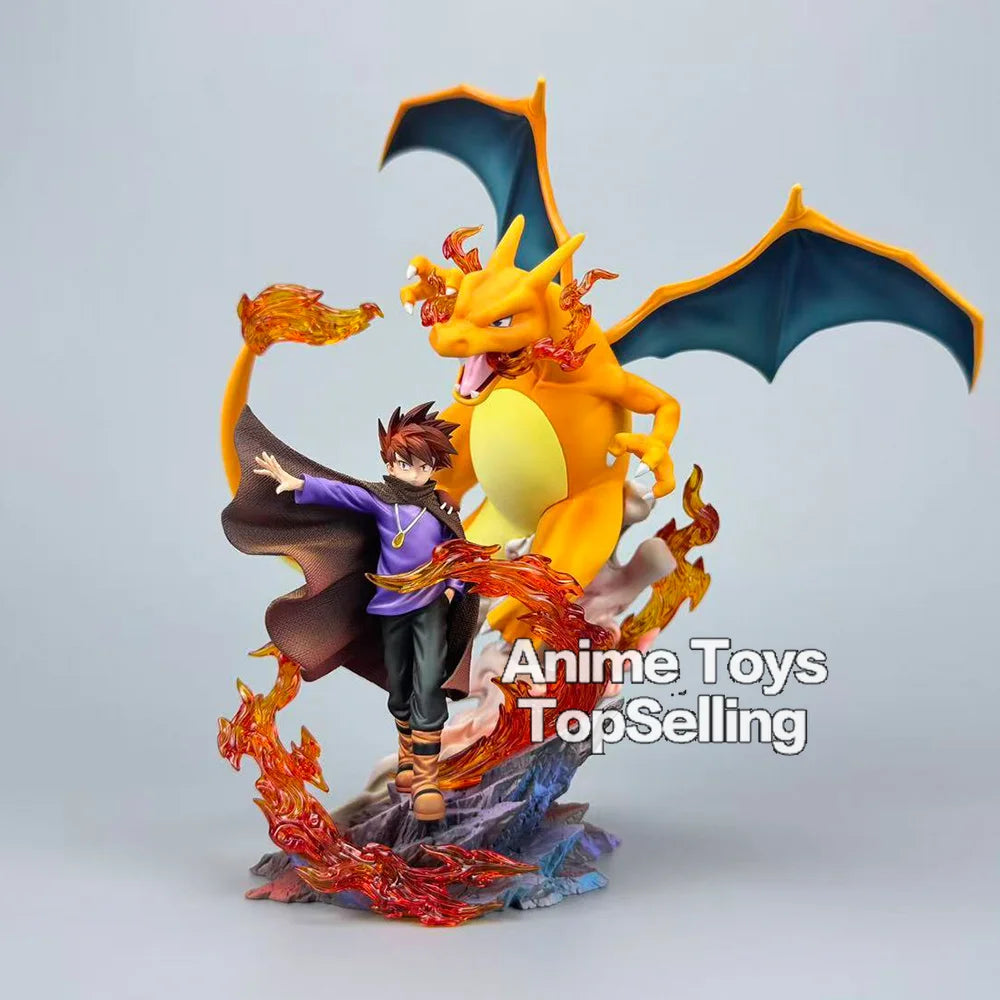 Superbe figurine de collection représentant Dracaufeu aux côtés de son dresseur avec effets de flammes