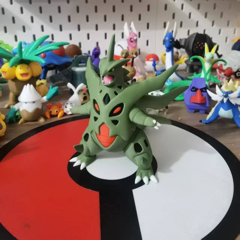Figurines Pokémon de la ligne évolutive d'Embrylex, Ymphect, Tyranocif et Méga-Tyranocif