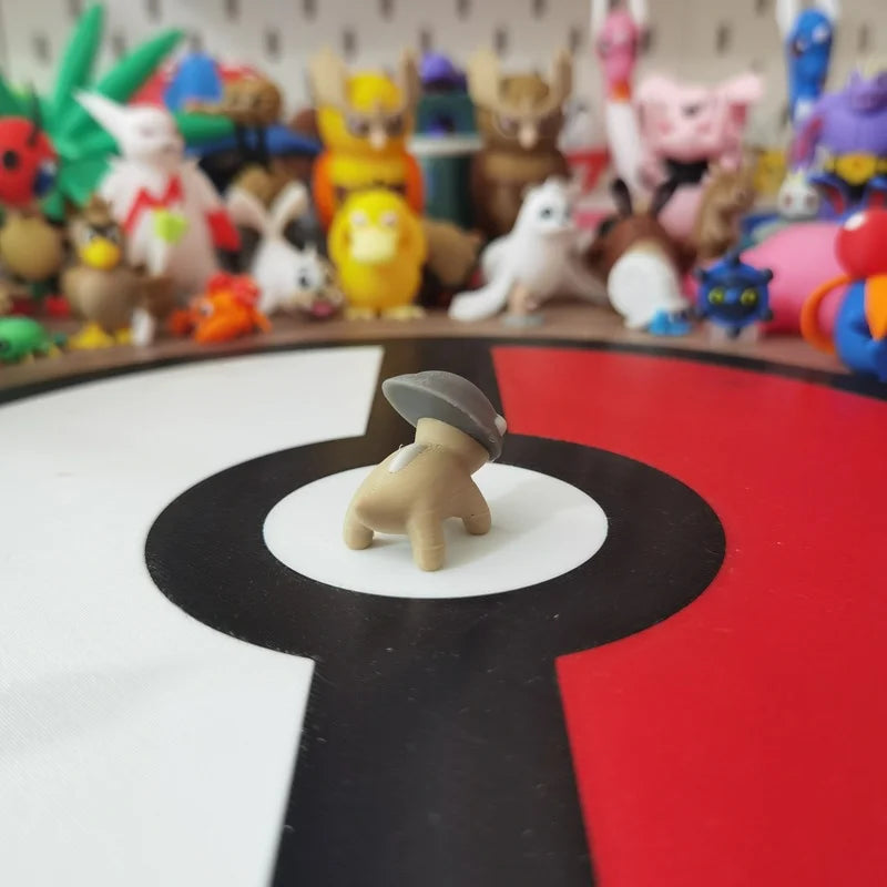 Figurines Pokémon fossiles de Dinoclier et son évolution Bastiodon.