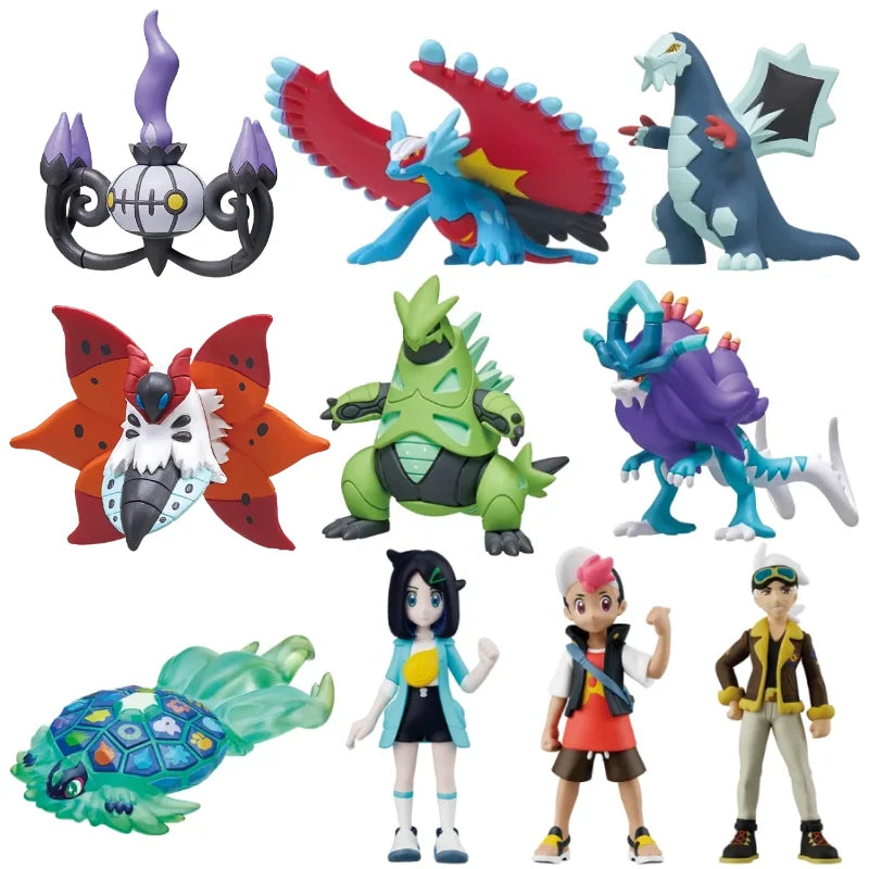 Sélection de figurines Pokémon variées incluant des Pokémon emblématiques, des formes de Teracristal et des dresseurs.