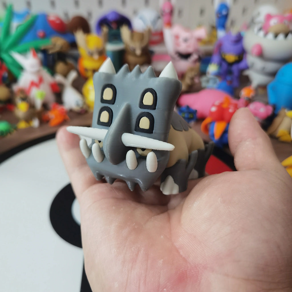 Figurines Pokémon fossiles de Dinoclier et son évolution Bastiodon.