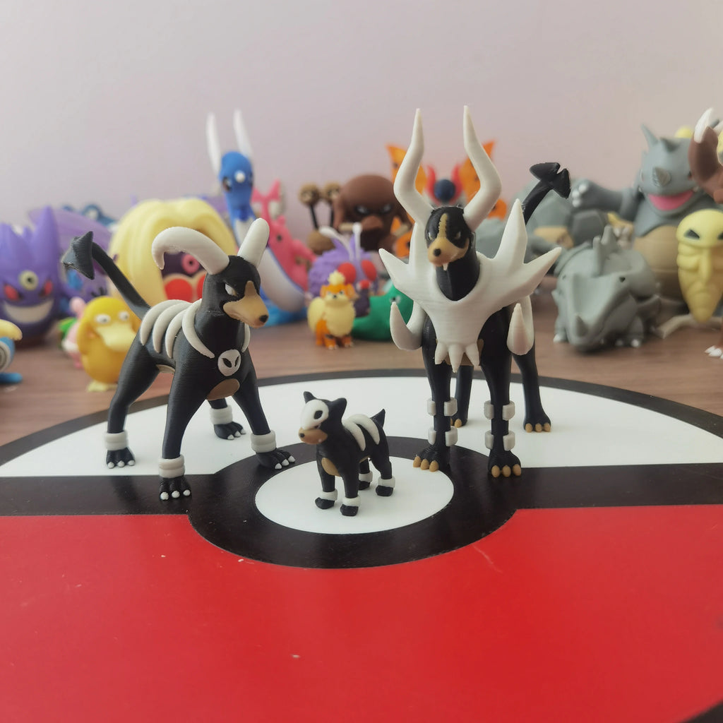 Figurines Pokémon de la ligne évolutive de Malosse, Démolosse et Méga-Démolosse.