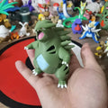 Figurines Pokémon de la ligne évolutive d'Embrylex, Ymphect, Tyranocif et Méga-Tyranocif