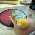 Figurines Pokémon de la ligne évolutive d'Insolourdo et sa forme évoluée Deuxdouspikes.