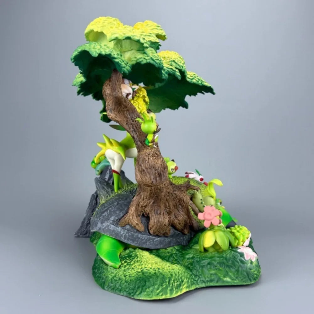 Grand diorama Pokémon sur le thème de la nature représentant un arbre majestueux avec plusieurs Pokémon de type Plante intégrés sur un environnement naturel