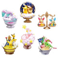 Lot de figurines Pokémon de collection avec des effets visuels d'attaques de feu, d'électricité et d'eau
