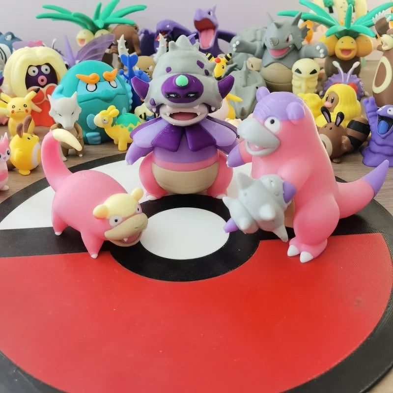 Ensemble de figurines Pokémon de la famille Ramoloss, Flagadoss et Roigada (versions classiques et de Galar).
