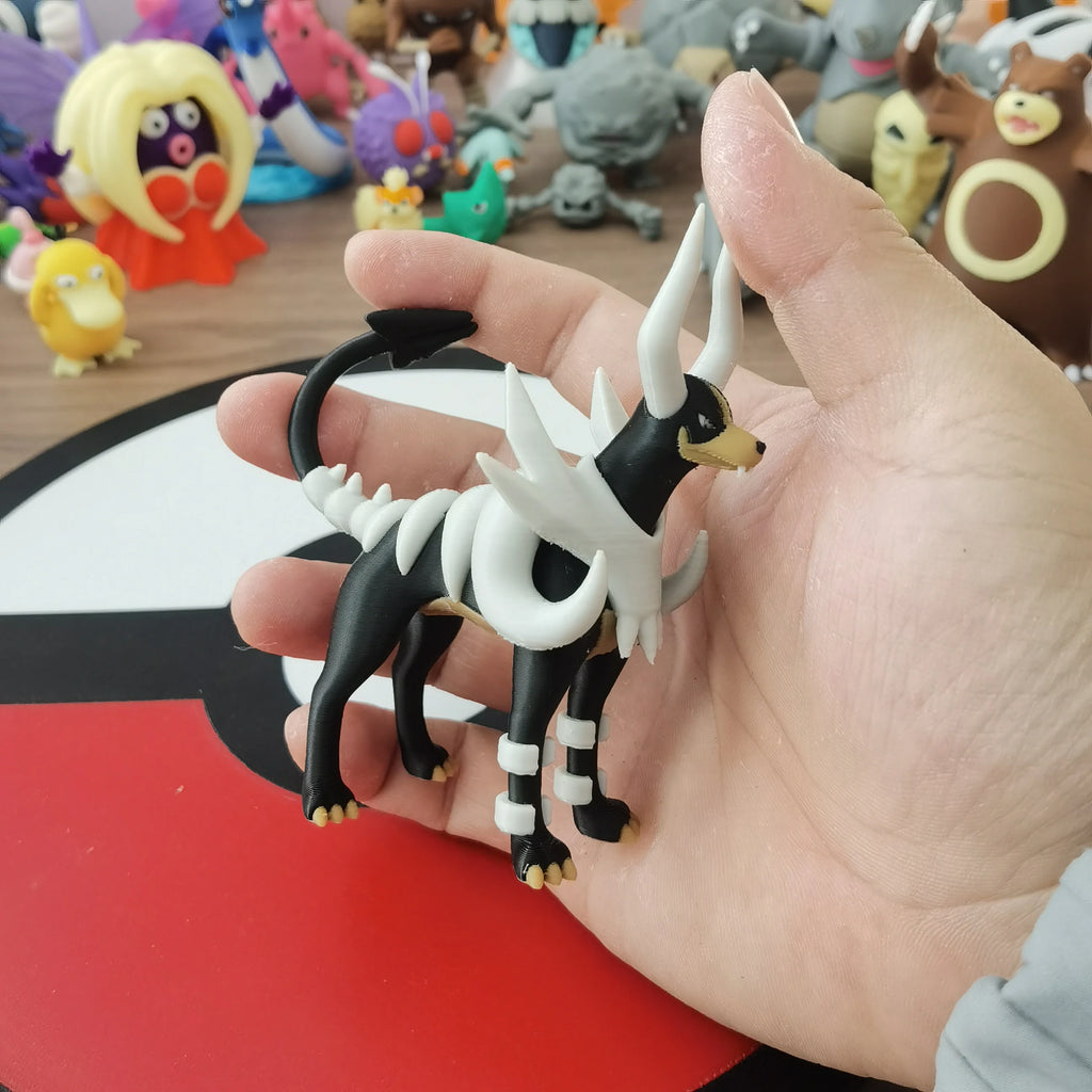 Figurines Pokémon de la ligne évolutive de Malosse, Démolosse et Méga-Démolosse.