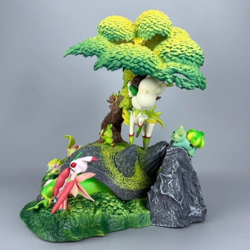 Grand diorama Pokémon sur le thème de la nature représentant un arbre majestueux avec plusieurs Pokémon de type Plante intégrés sur un environnement naturel