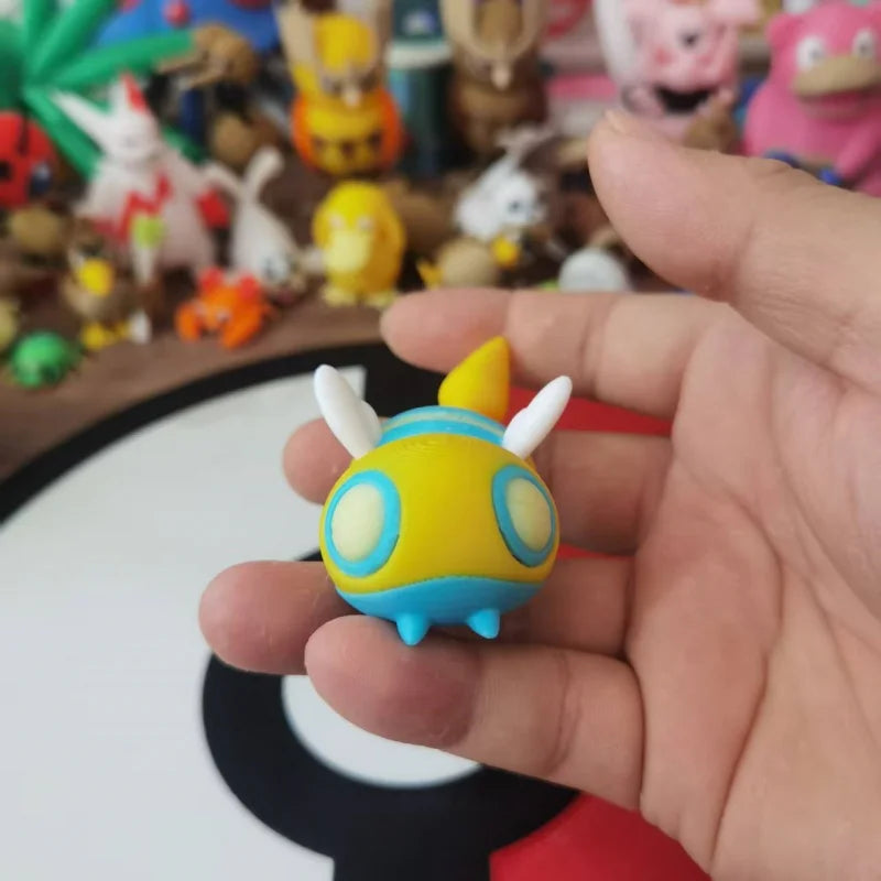 Figurines Pokémon de la ligne évolutive d'Insolourdo et sa forme évoluée Deuxdouspikes.