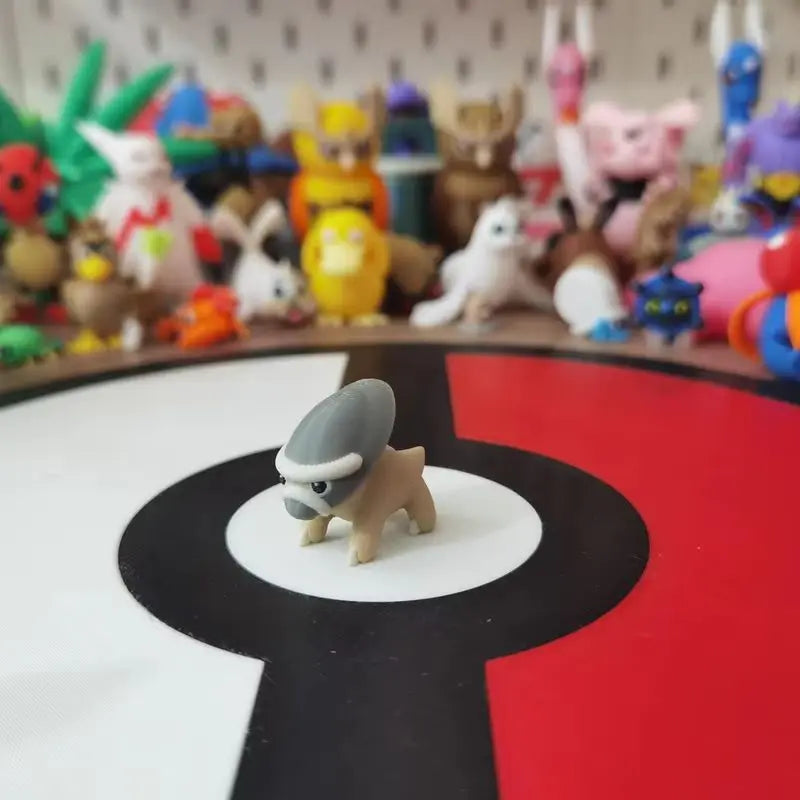 Figurines Pokémon fossiles de Dinoclier et son évolution Bastiodon.