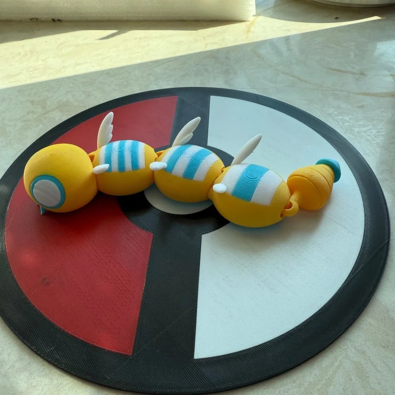 Figurines Pokémon de la ligne évolutive d'Insolourdo et sa forme évoluée Deuxdouspikes.