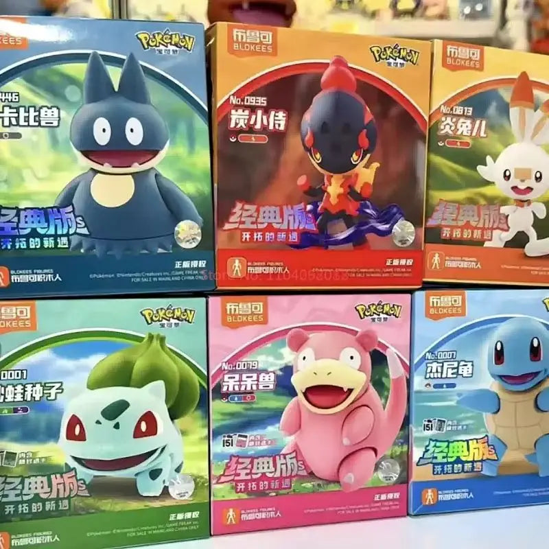Figurines Pokémon sur socles thématiques représentants divers Pokémon populaires dans leur environnement