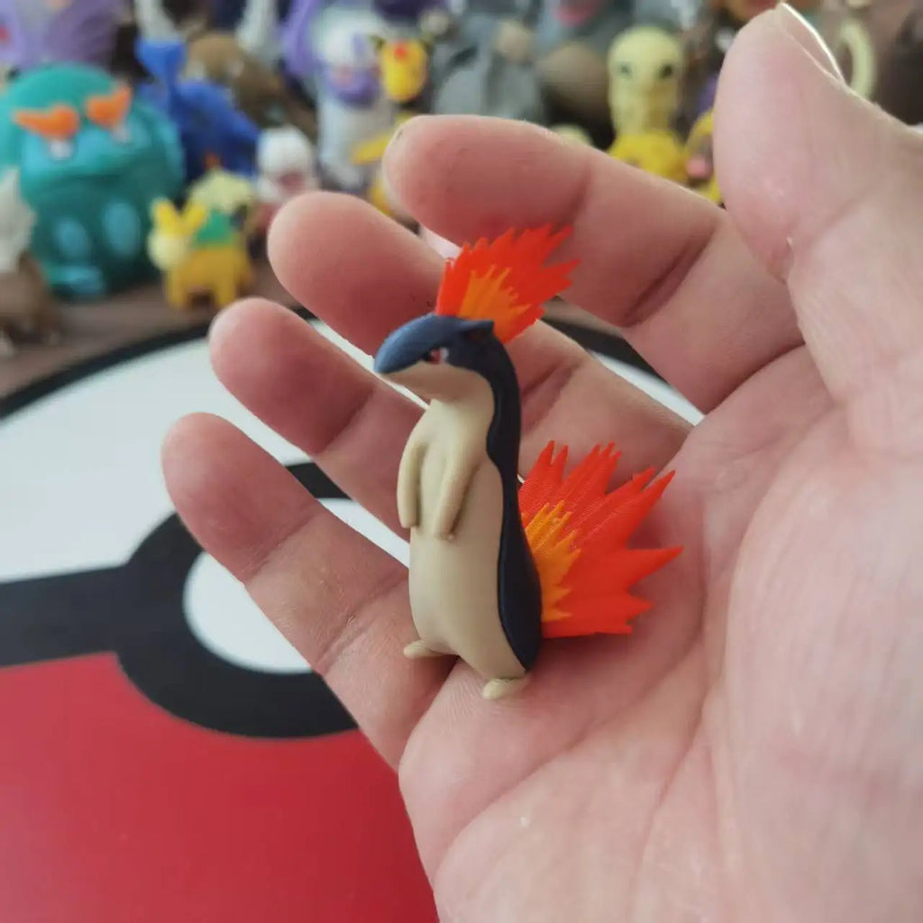 Figurines Pokémon du starter Feu de Johto : Héricendre, Feurisson et Typhlosion.