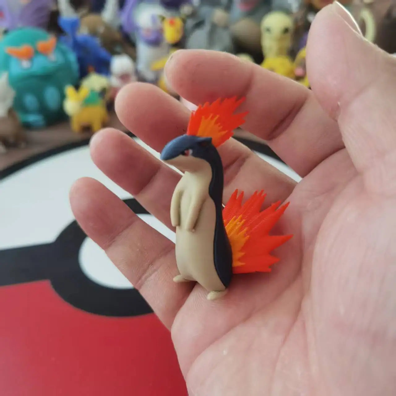 Figurines Pokémon du starter Feu de Johto : Héricendre, Feurisson et Typhlosion.
