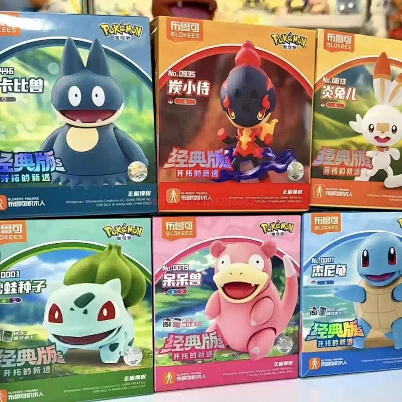 Figurines Pokémon sur socles thématiques représentants divers Pokémon populaires dans leur environnement