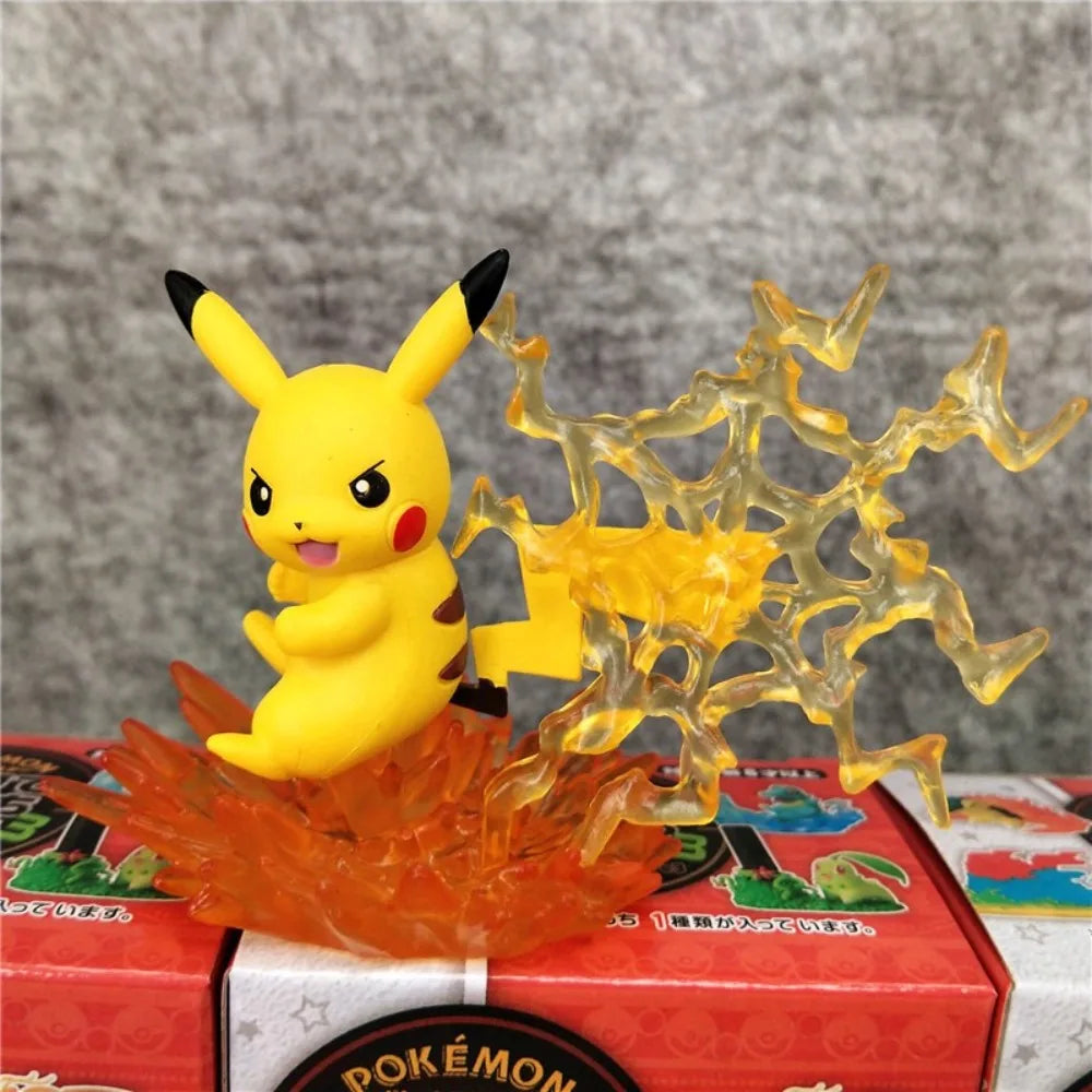 Ensemble de figurines Pokémon incluant des formes Teracristal translucides et des lignes évolutives