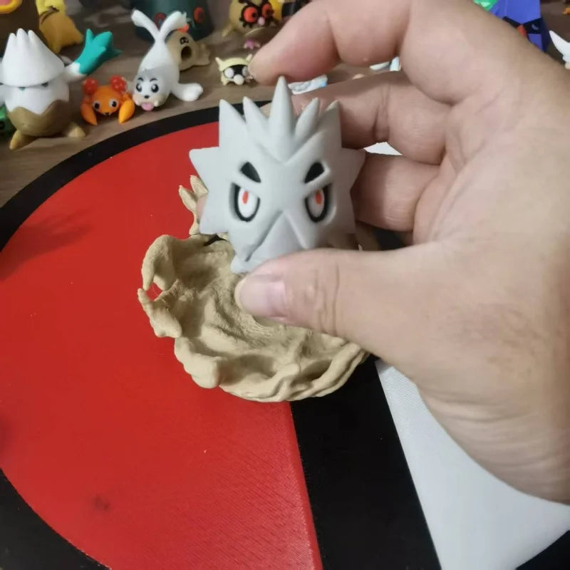 Figurines Pokémon de la ligne évolutive d'Embrylex, Ymphect, Tyranocif et Méga-Tyranocif
