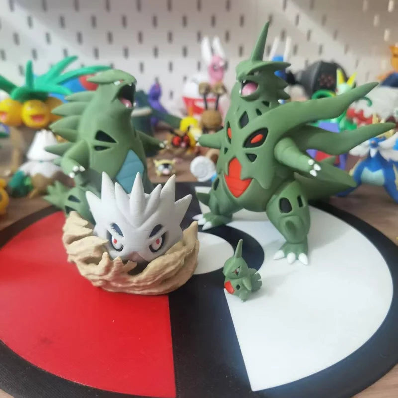 Figurines Pokémon de la ligne évolutive d'Embrylex, Ymphect, Tyranocif et Méga-Tyranocif