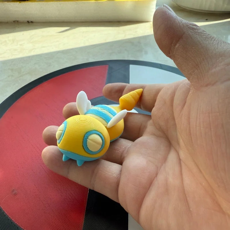 Figurines Pokémon de la ligne évolutive d'Insolourdo et sa forme évoluée Deuxdouspikes.