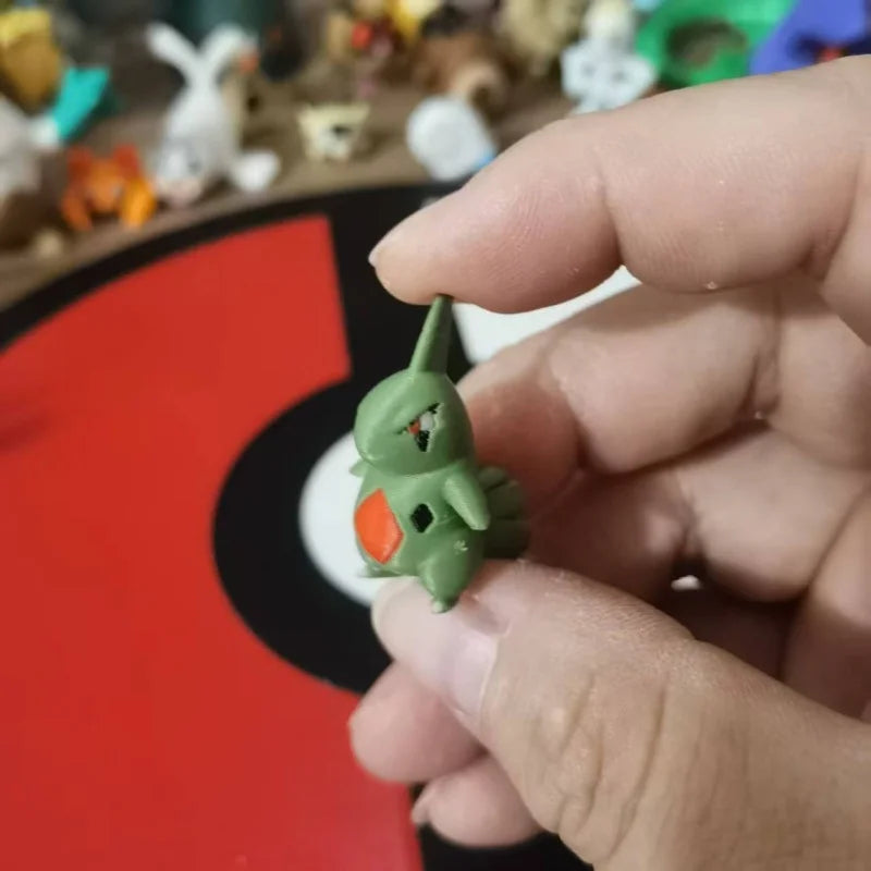 Figurines Pokémon de la ligne évolutive d'Embrylex, Ymphect, Tyranocif et Méga-Tyranocif